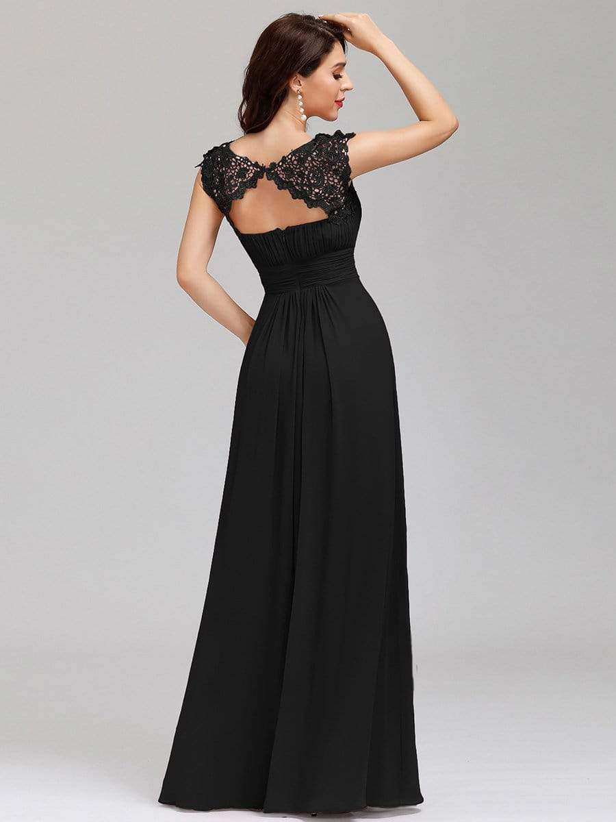 Back pose of woman in elegant sleeve lace and chiffon bridesmaid dress in black