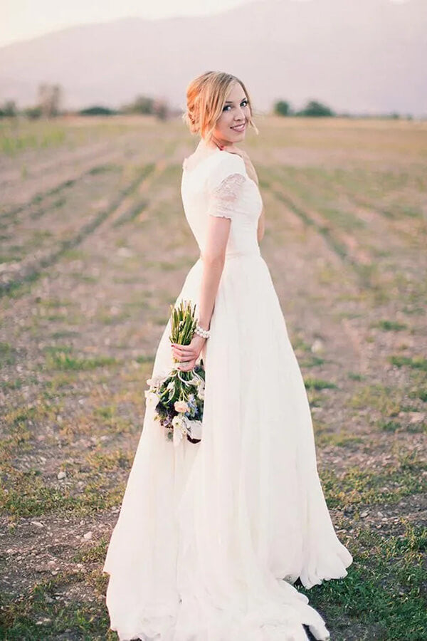 a line wedding dress | v neck wedding dress | vintage wedding dress | musebridals.com