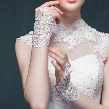 Fingerless Elegant Short Lace Wedding Gloves | Bridelily - wedding gloves