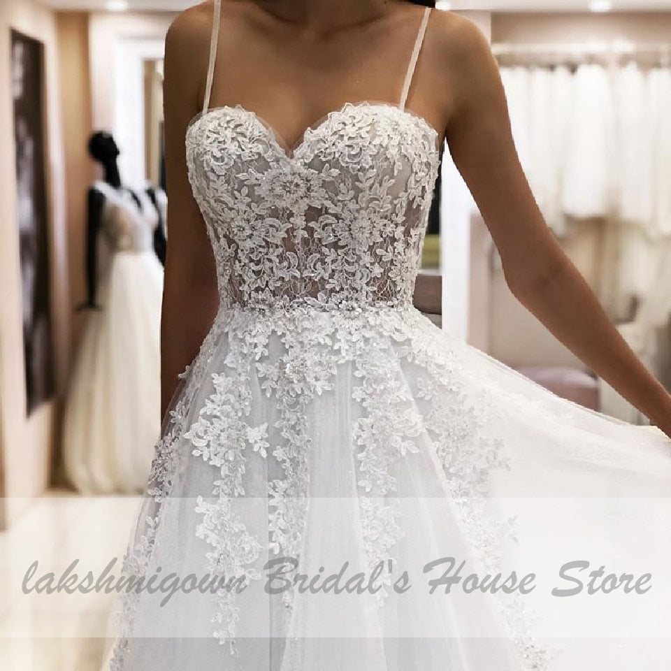 2021 Trouwjurk Sexy A Line Wedding Dress Spaghetti Straps Vintage Lace Applique Beaded Off White Tulle Mariage Long Bridal Dress - ROYCEBRIDAL OFFICIAL STORE