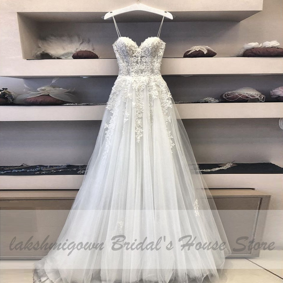 2021 Trouwjurk Sexy A Line Wedding Dress Spaghetti Straps Vintage Lace Applique Beaded Off White Tulle Mariage Long Bridal Dress - ROYCEBRIDAL OFFICIAL STORE