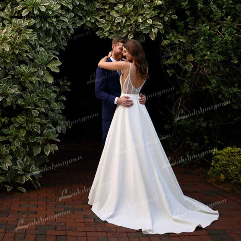 Simple A-Line Soft Satin Wedding Dresses 2021 V-Neck Sleeveless Lace Spaghetti Straps Hidden Skirt Pockets Backless Bride Gown - ROYCEBRIDAL OFFICIAL STORE