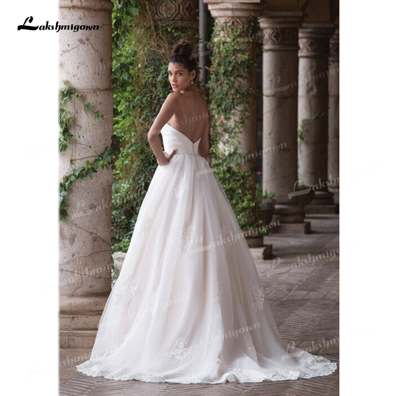 Beautifully A-Line Tulle Wedding Dresses Sweetheart Neck Strapless Sleeveless Open Back Beading Sashes Court Train Bride Gowns - ROYCEBRIDAL OFFICIAL STORE