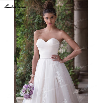 Beautifully A-Line Tulle Wedding Dresses Sweetheart Neck Strapless Sleeveless Open Back Beading Sashes Court Train Bride Gowns - ROYCEBRIDAL OFFICIAL STORE