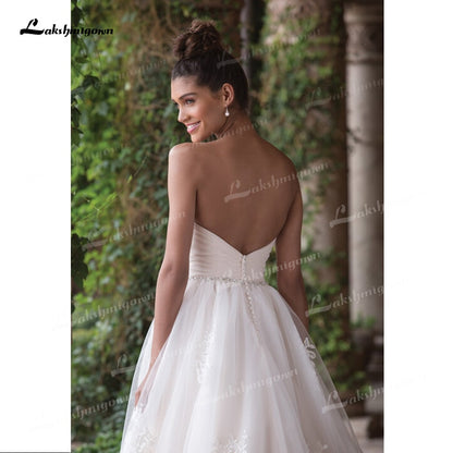 Beautifully A-Line Tulle Wedding Dresses Sweetheart Neck Strapless Sleeveless Open Back Beading Sashes Court Train Bride Gowns - ROYCEBRIDAL OFFICIAL STORE