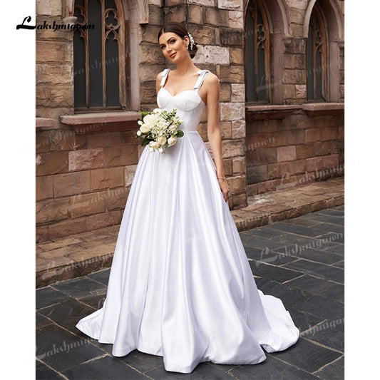 A-Line/Princess Soft Satin Wedding Dresses Low Sweetheart Neck Ruffles Straps Sleeveless Sweep/Brush Train Simple Bride Gown - ROYCEBRIDAL OFFICIAL STORE