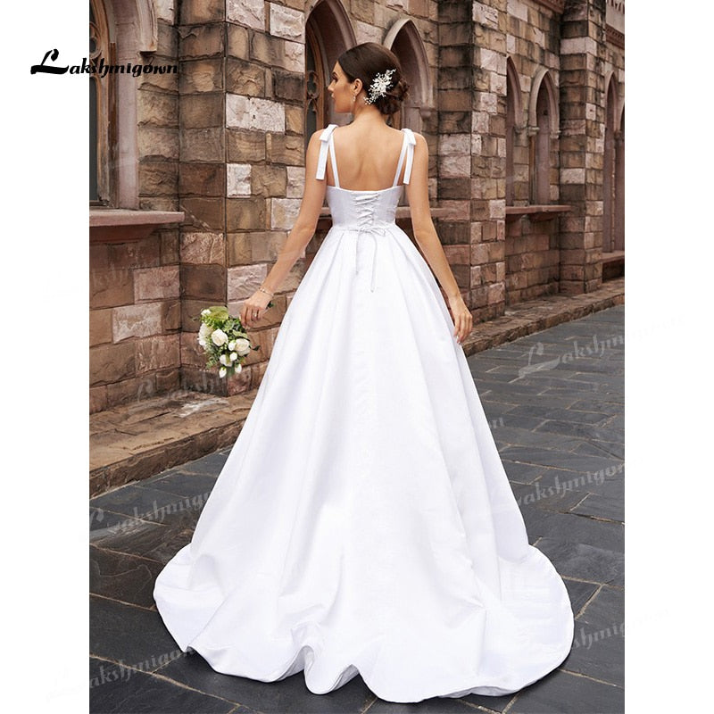 A-Line/Princess Soft Satin Wedding Dresses Low Sweetheart Neck Ruffles Straps Sleeveless Sweep/Brush Train Simple Bride Gown - ROYCEBRIDAL OFFICIAL STORE